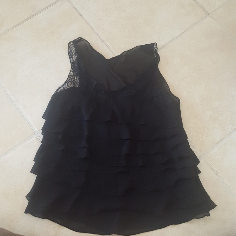Cute express top with lace and ruffles. size small
